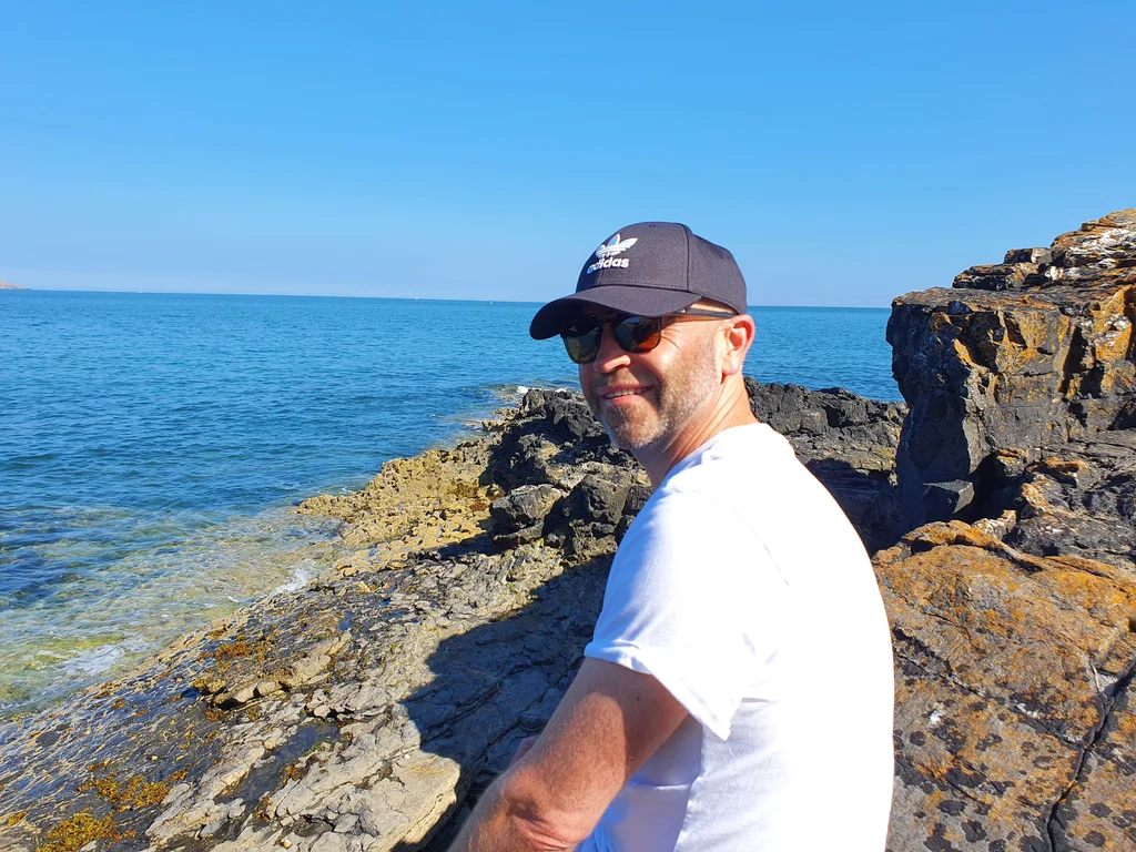 Man walking on a bright sunny day